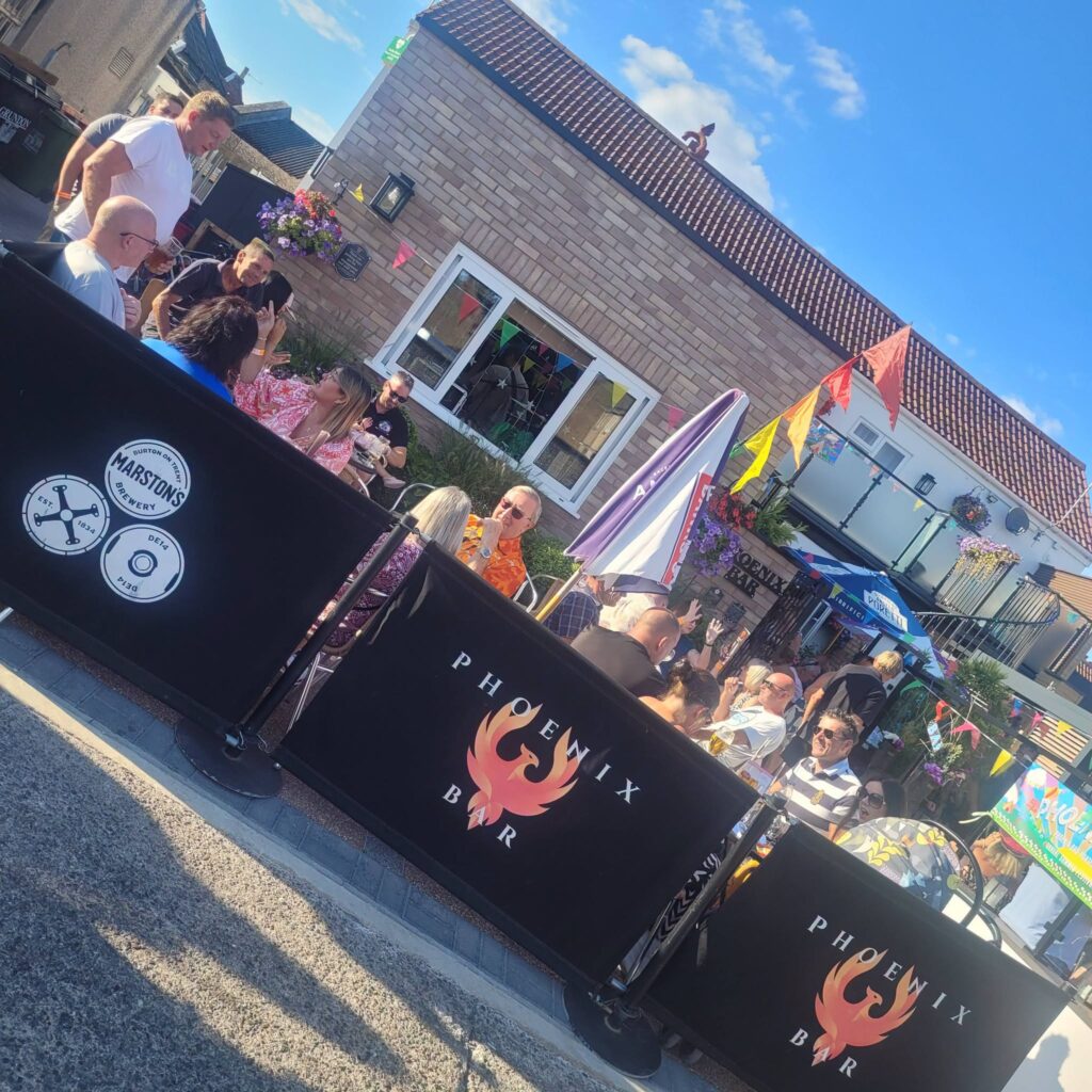 A busy sunny afternoon on the Phoenix Bar terrace