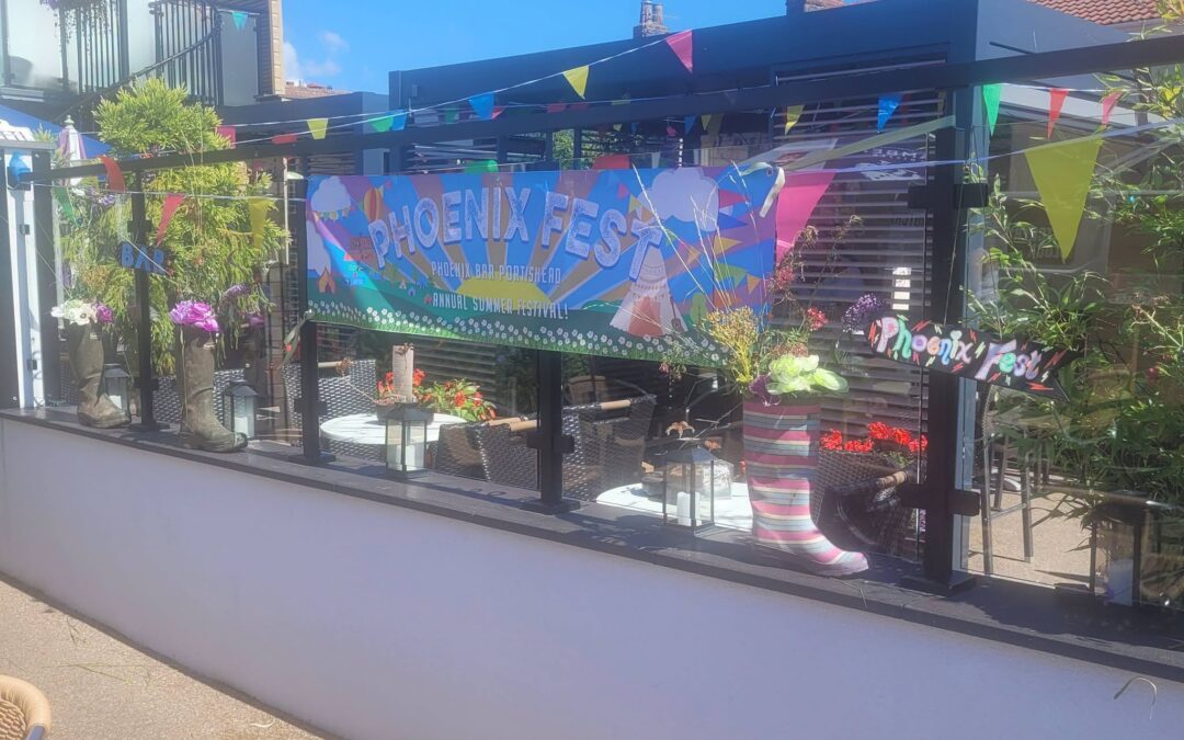 Phoenix Fest banner on the terrace, our annual summer festival