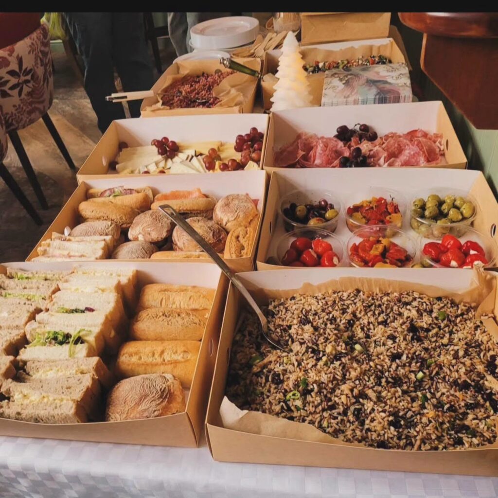 Grazing buffet with cheese, charcuterie, olives and salads