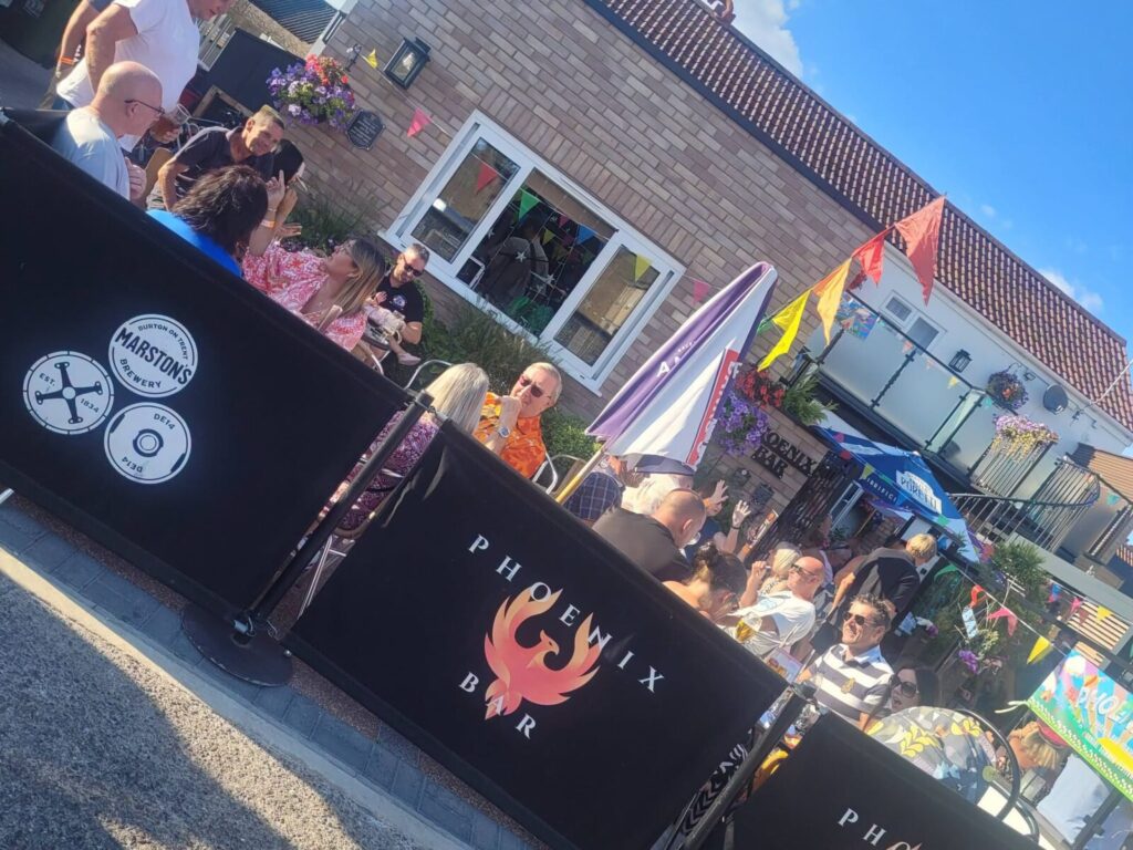 A busy sunny afternoon on the Phoenix Bar terrace